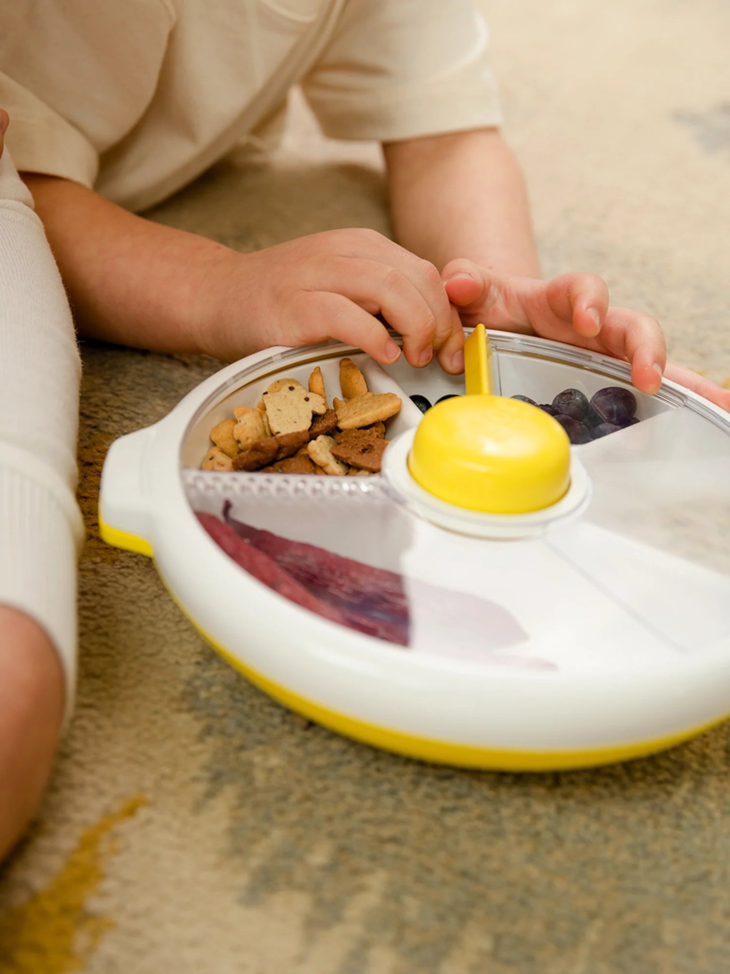 Göbe Spinner SLIDE (veľký) - boxík s tlačidlom pre najmenších so 4 priehradkami žltý