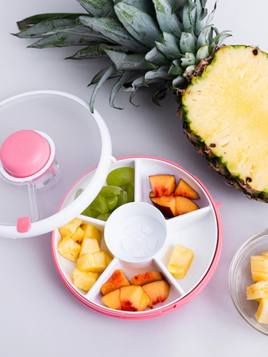 Göbe Spinner FLIP (malý) - boxík s tlačidlom pre najmenších s 5 priehradkami ružová