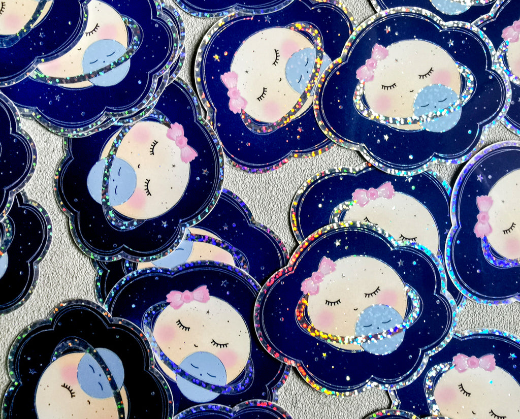 Trblietavá vodeodolná nálepka Planéta